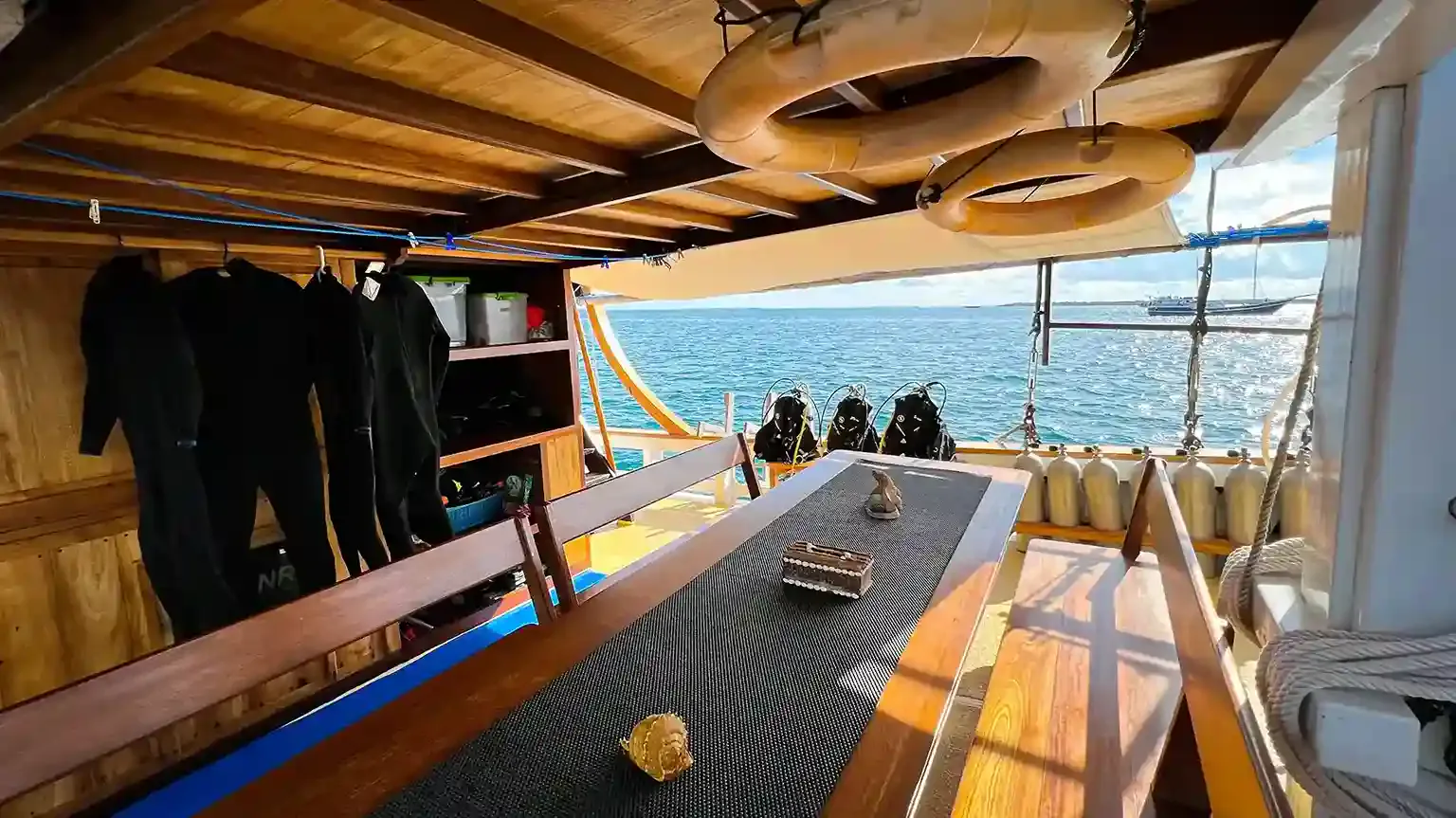 Dive gear rigged on the deck of a phinisi