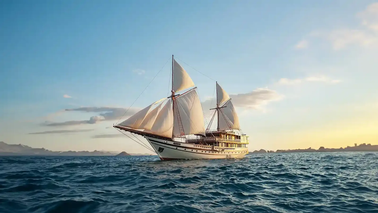 A phinisi under sail in Komodo National Park