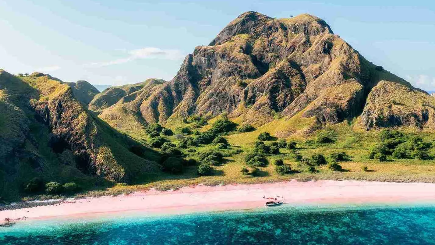 Wide aerial view of Pink Beach and the reef