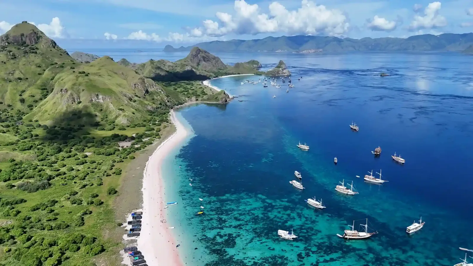 Charter boats anchored off Pink Beach